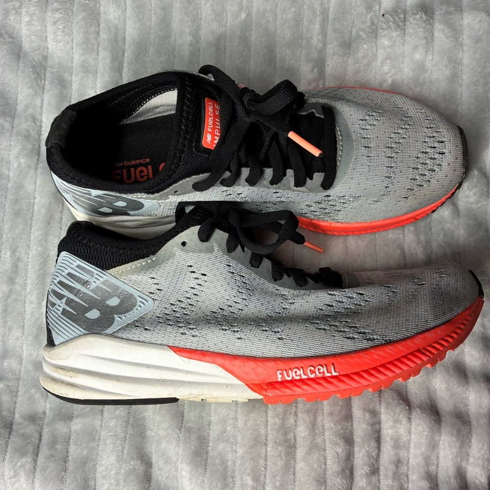New Balance Women’s Light Blue and Orange Impulse Running Shoes